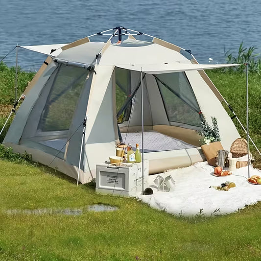 Camping tent with outdoor furniture and food near a body of water Biggreenbear.com