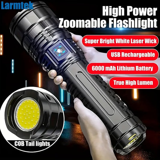 High power zoomable flashlight with USB rechargeable feature, held by a hand. Biggreenbear.com Big Green Bear