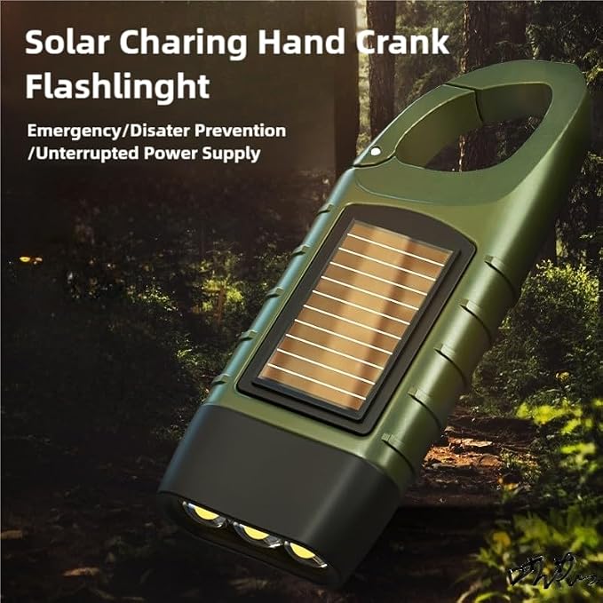 Solar charging hand crank flashlight with solar panel in a forest setting