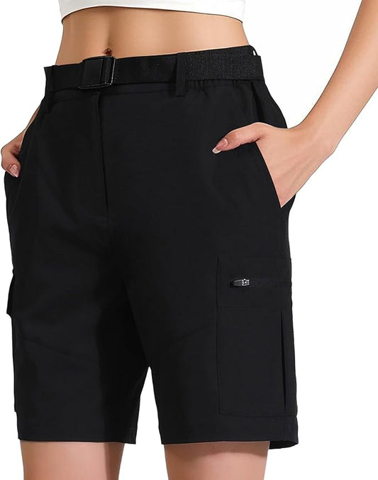 Women's 7" black hiking cargo shorts with multi-pockets and removable belt on white background.