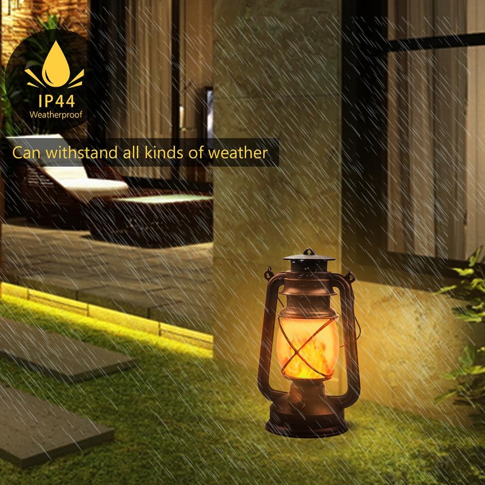 Outdoor lantern lighting up a pathway during rain with IP44 weatherproof label.