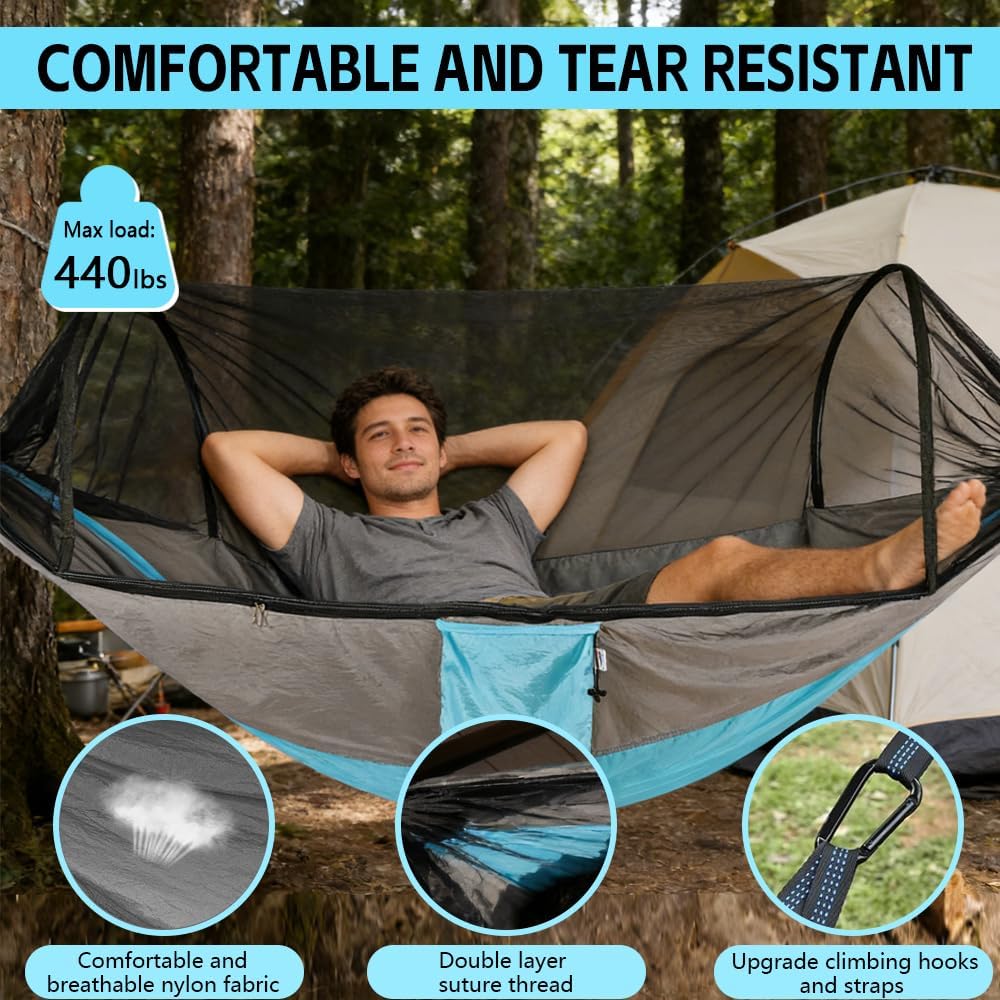 A man reclining in a gray and turquoise camping hammock with a black mosquito net, shown outdoors in a forest with a tent in the background. Text at the top reads 'COMFORTABLE AND TEAR RESISTANT' with a max load of 440 lbs, and three circular feature callouts at the bottom highlight breathable fabric, double-layer suture thread, and upgraded climbing hooks and straps.