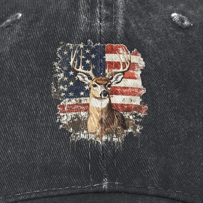Close-up of a dark gray denim cap featuring a distressed graphic of a deer head in front of an American flag.