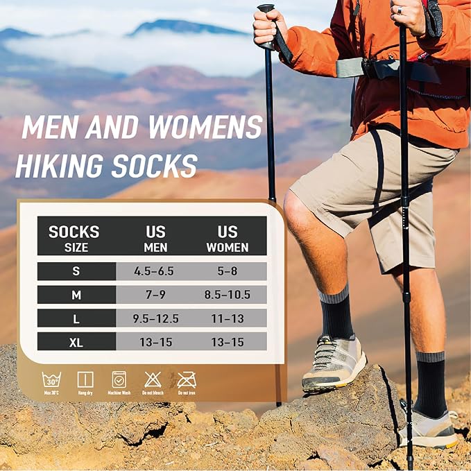 A person hiking in a mountainous outdoor setting holds hiking poles while wearing an orange jacket, tan shorts, and black socks. A large text overlay reads 'MEN AND WOMENS HIKING SOCKS' and a size chart lists socks sizes US Men and US Women from S to XL.