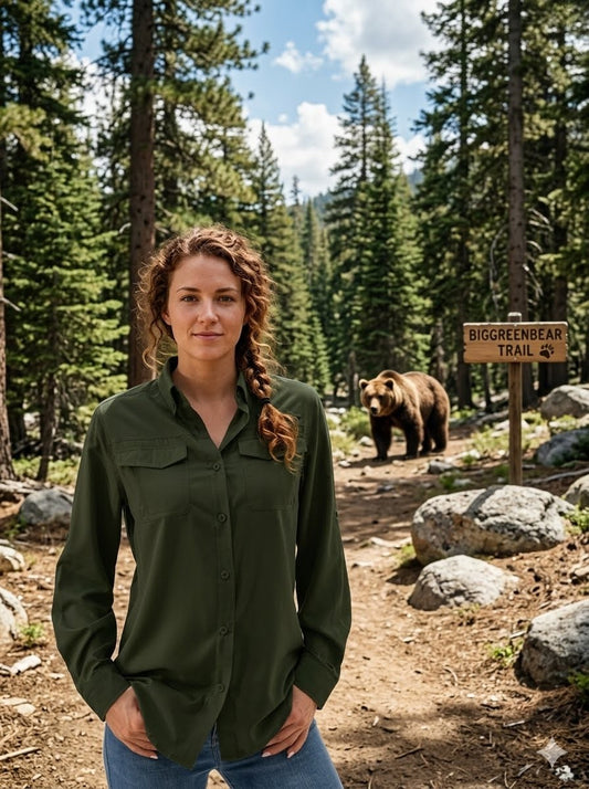 Woman standing in a forest with a bear in the background big green bear