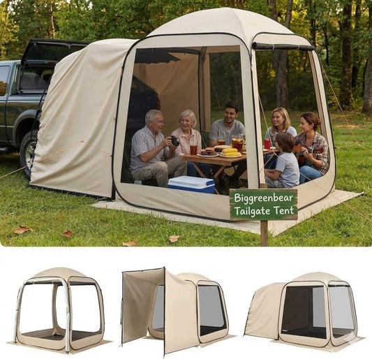 Biggreenbear tailgate tent with people inside, set up outdoors on grass.