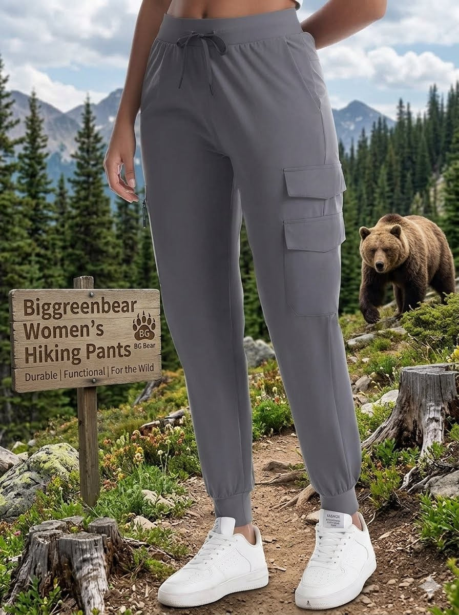 Biggreenbear.com women wearing hiking pants brown bear in the backround