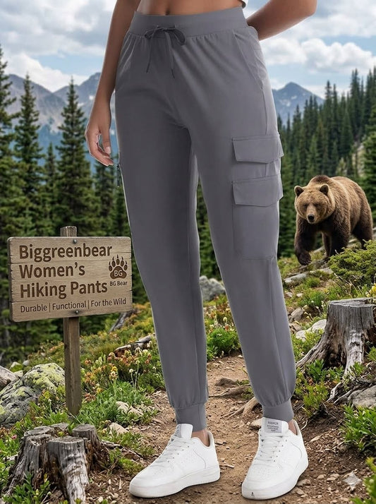 Biggreenbear.com women wearing hiking pants brown bear in the backround