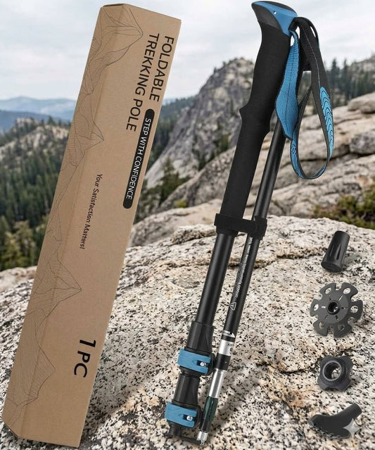 Blue aluminum collapsible hiking pole fully extended for trail trekking. big green bear