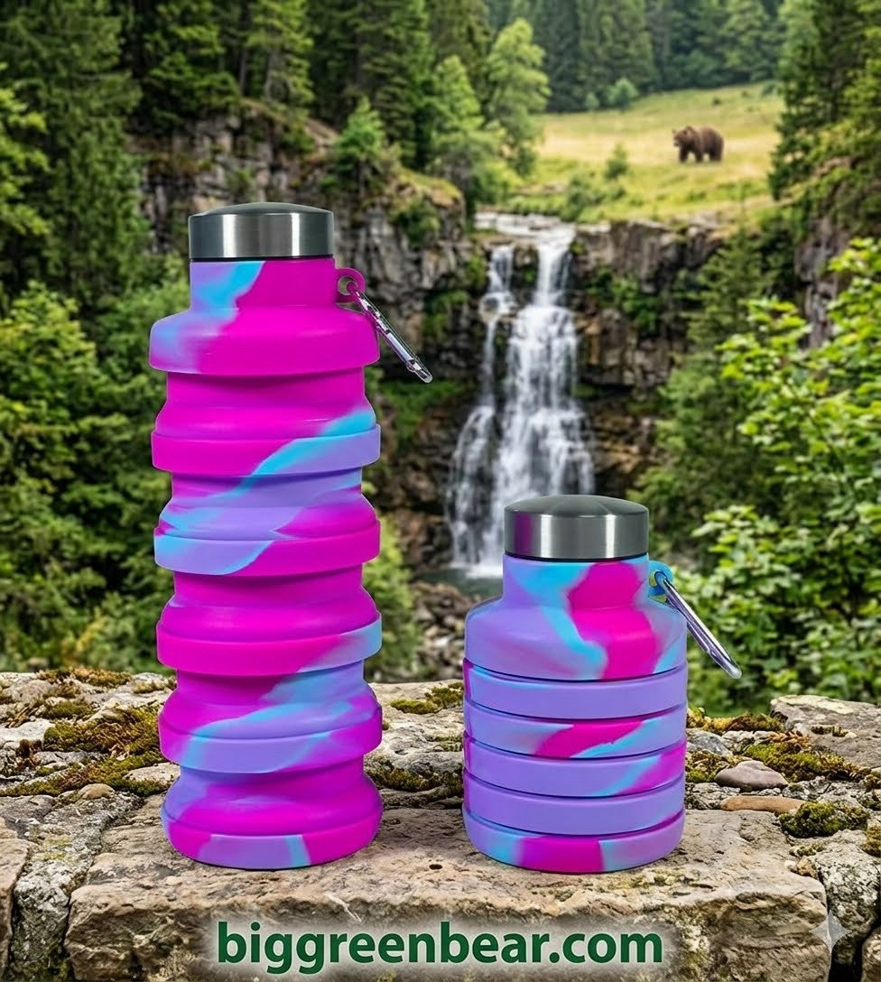 500ml pink and blue camouflage collapsible sports water bottle by Big Green Bear shown expanded and collapsed near a scenic waterfall.