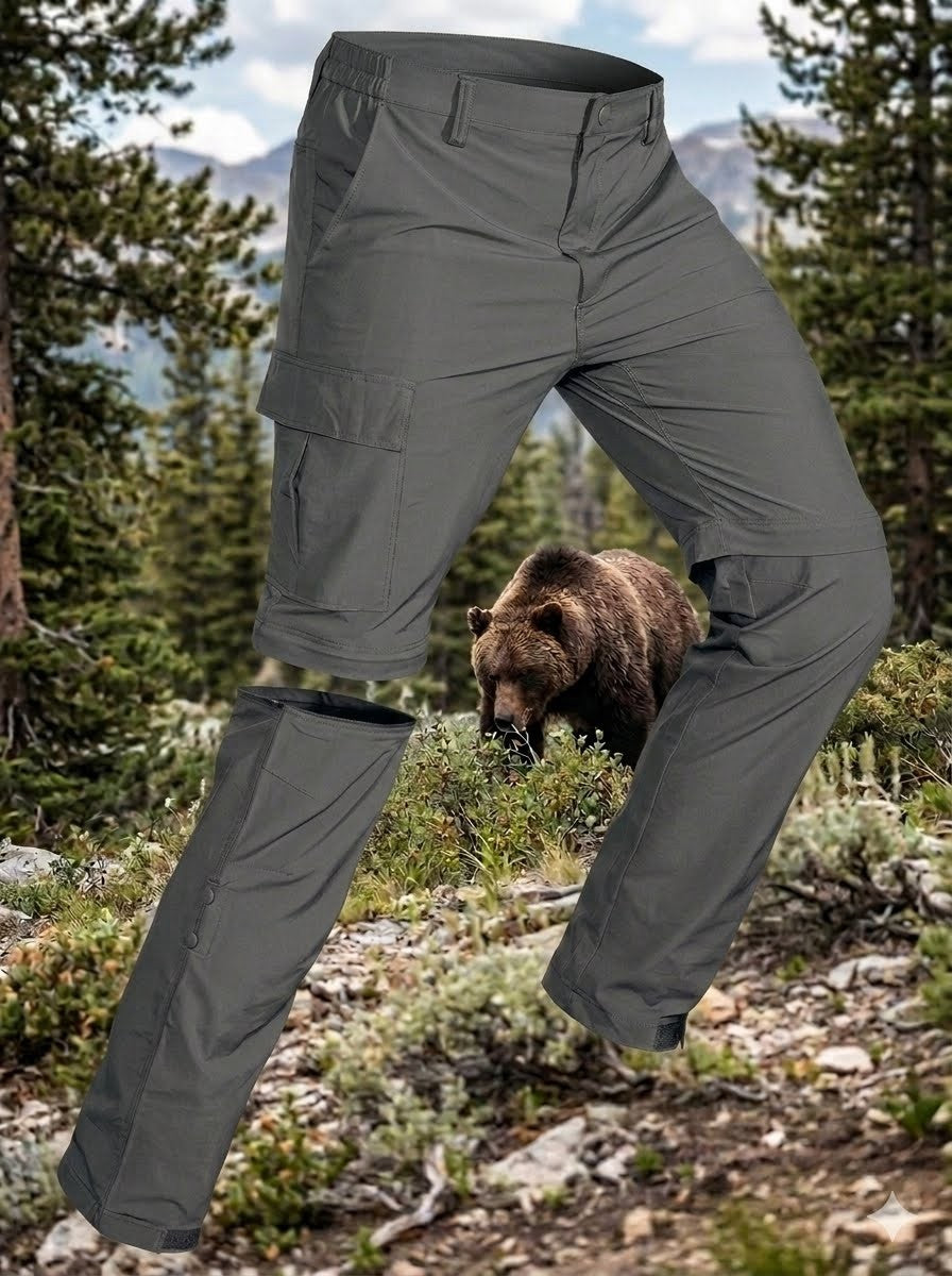 Gray pants displayed against a natural background with a bear and mountains. Big Green Bear