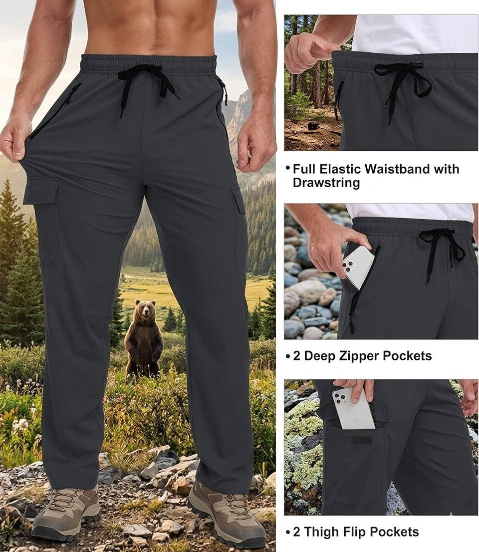 Dark gray pants with features highlighted, including an elastic waistband, deep zipper pockets, and thigh flip pockets, worn outdoors.