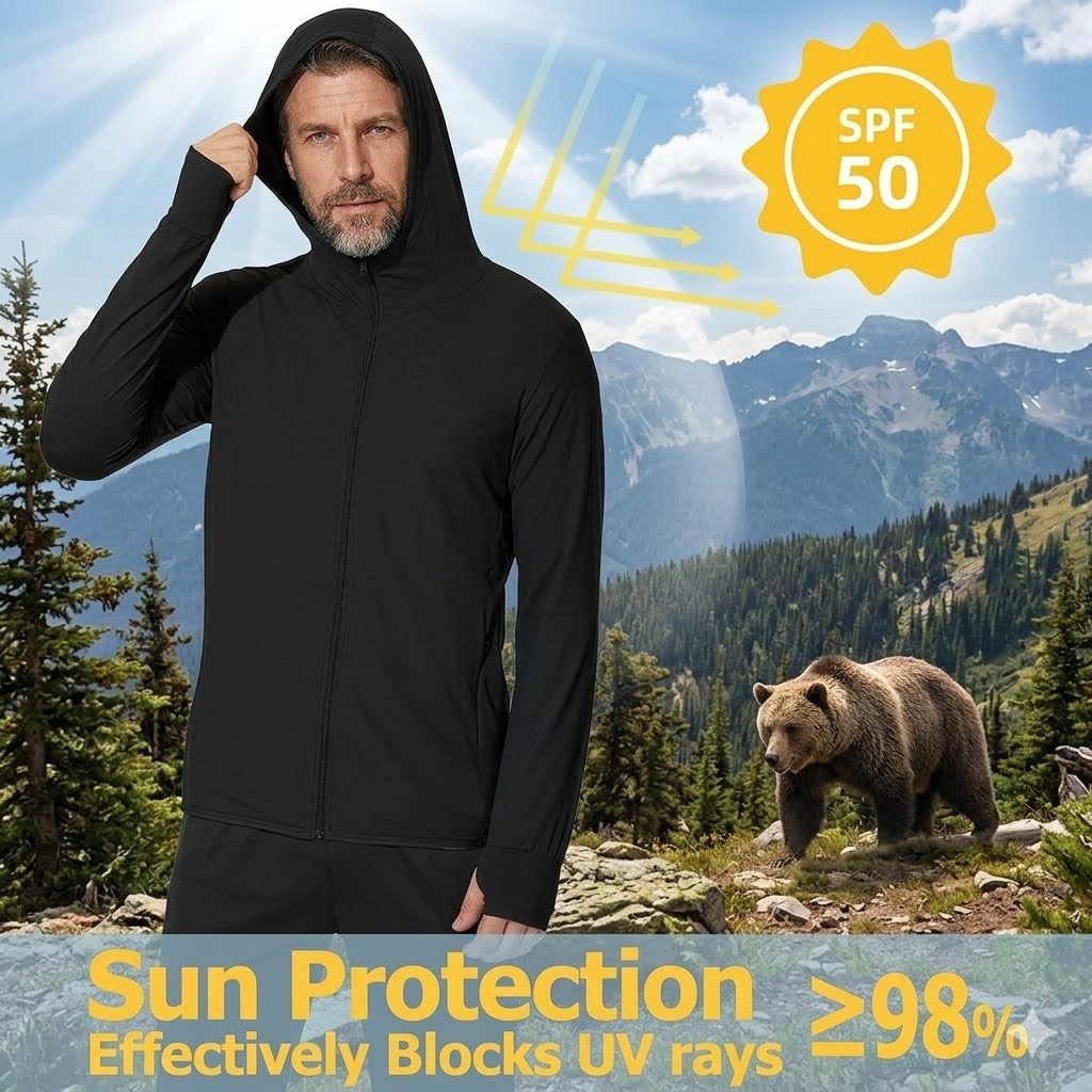 Man wearing a black hoodie with sun protection features against a mountainous background