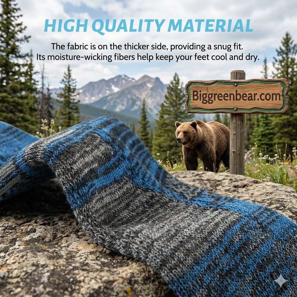 Blue and gray socks on a rock with a bear and mountain background, featuring Biggreenbear.com.