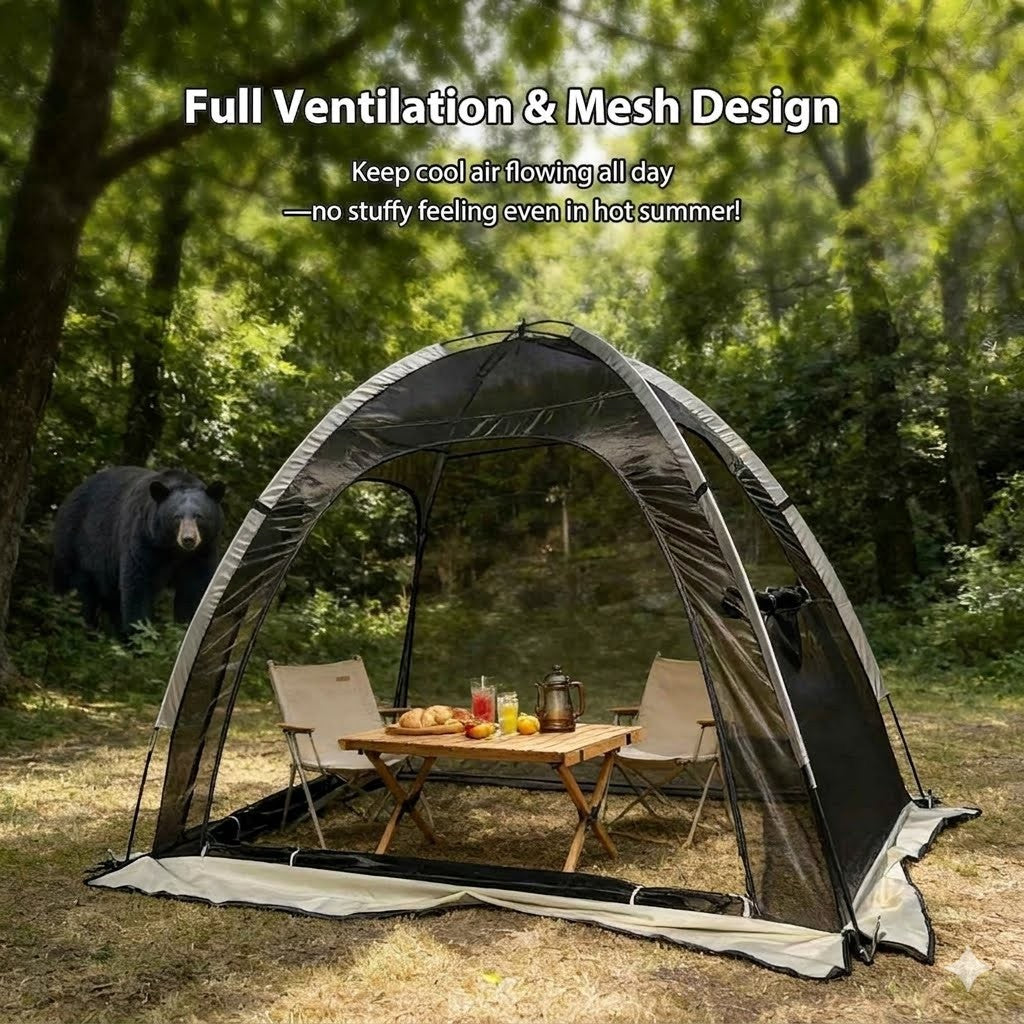 Outdoor setting with a screened-in gazebo, table, chairs, and bear in the background.