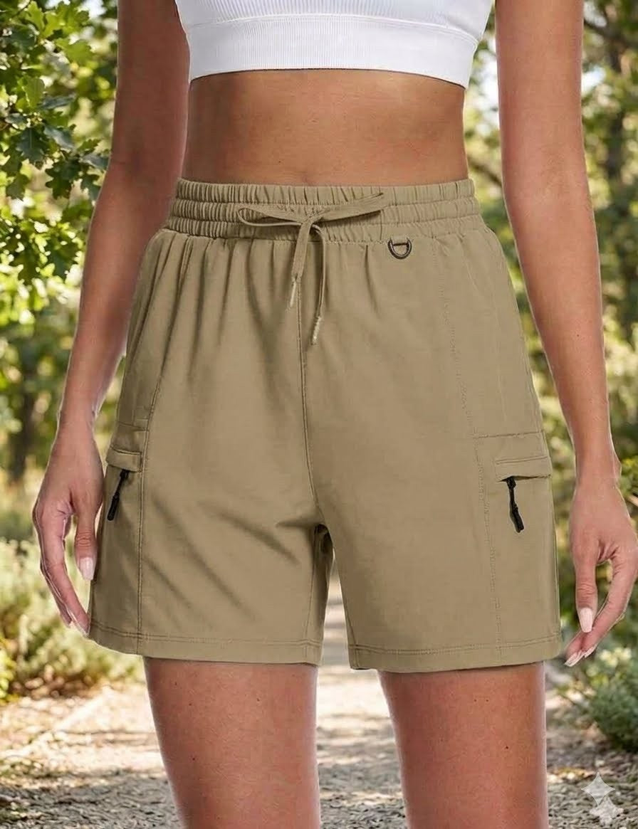Person wearing beige cargo shorts with a blurred natural background big green bear