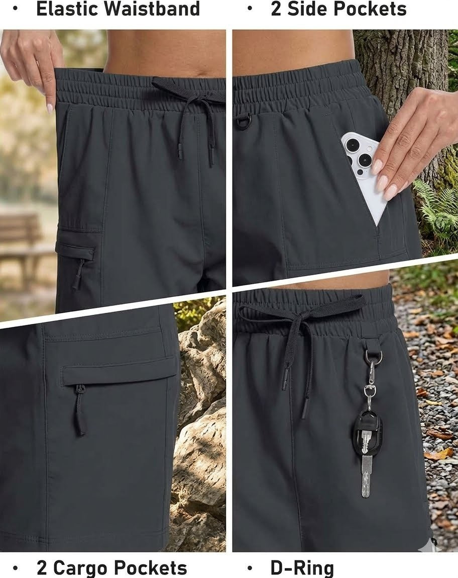 Black pants with elastic waistband, side pockets, cargo pockets, and D-ring feature.