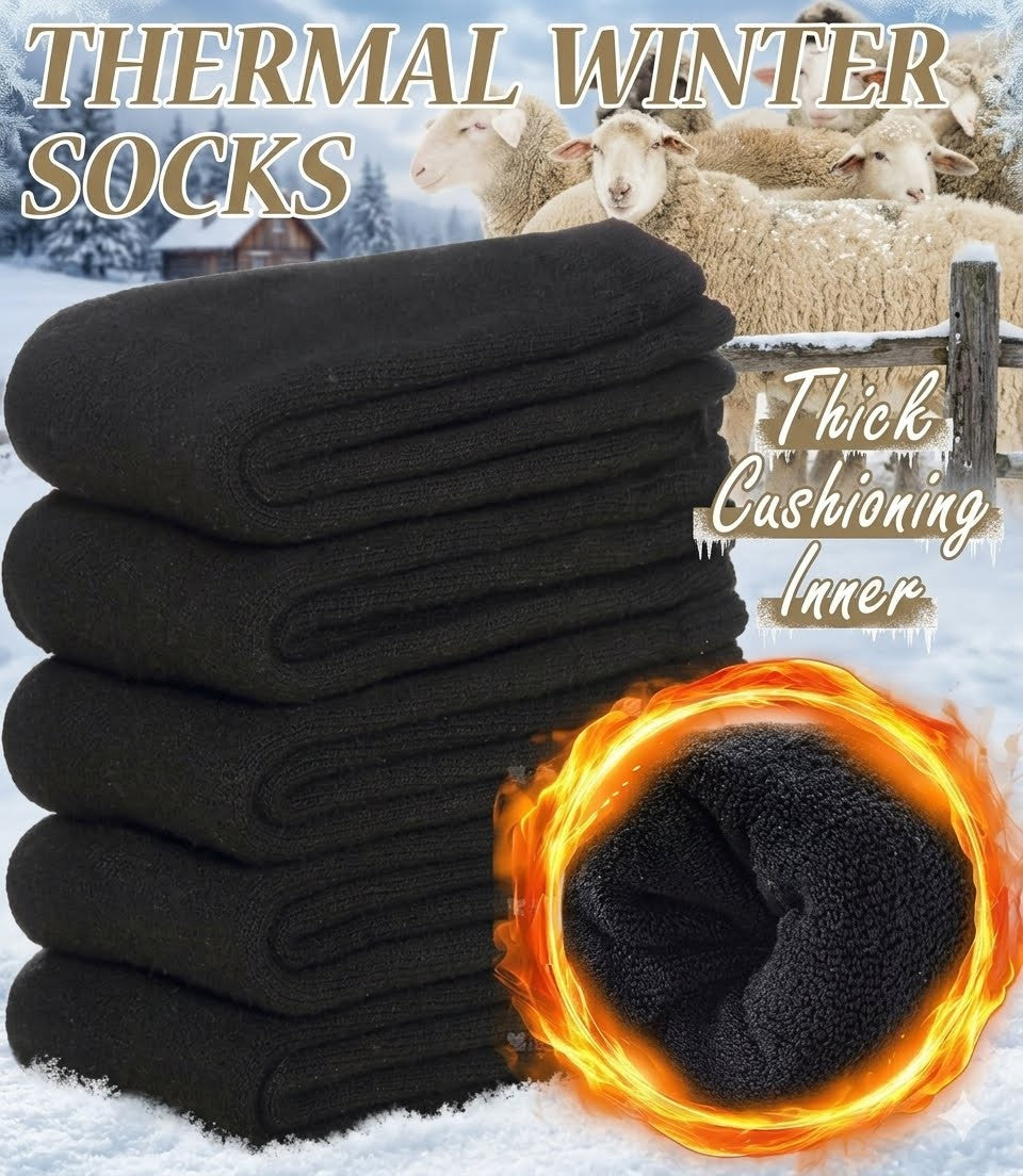 A stack of black thermal winter socks shown in a snowy outdoor scene with sheep in the background, plus text reading 'Thick Cushioning Inner' and a fiery inset showing the warm interior lining.