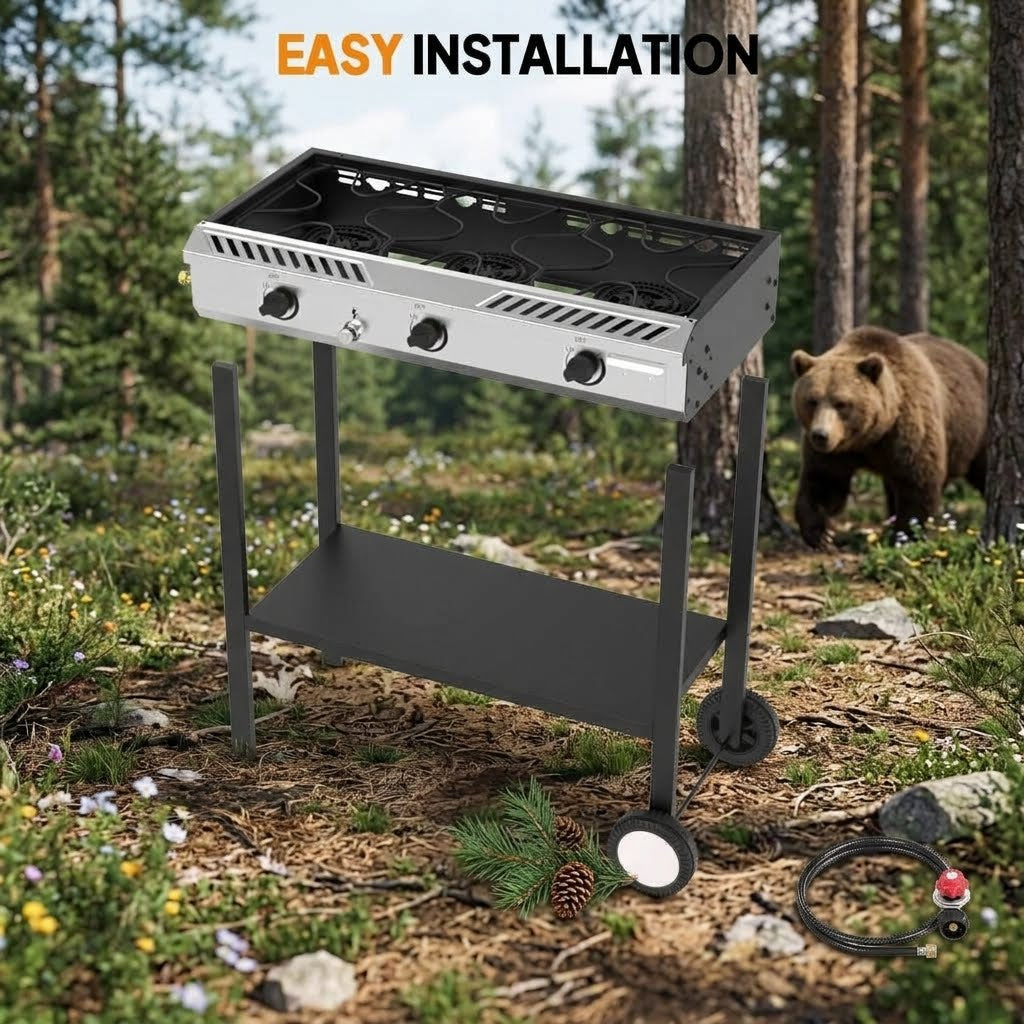 Exploded assembly view of a modular 3-burner gas stove showing the detachable legs, bottom storage shelf, wheels, and propane regulator hose against a forest backdrop.