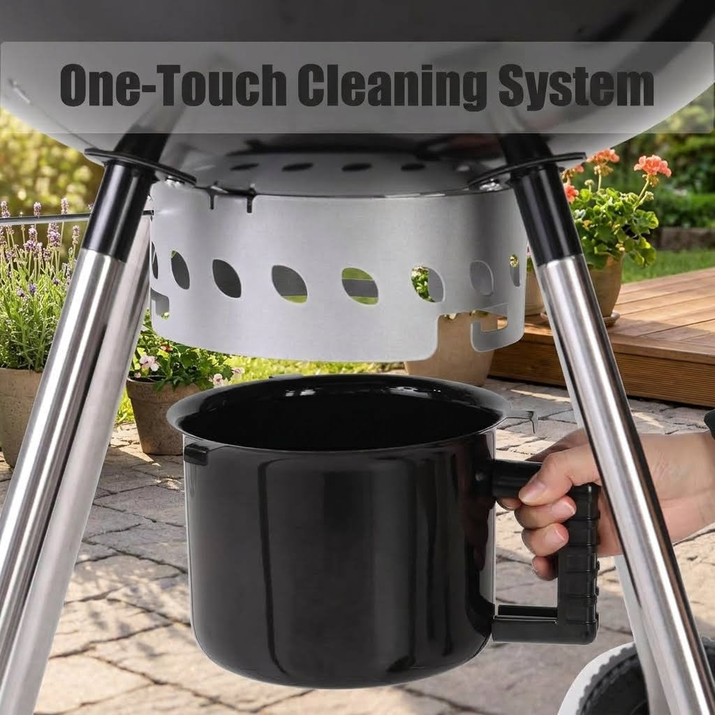 A black handled cleaning pot being held under a grill by a hand, with the text 'One-Touch Cleaning System' across the top. The scene is outdoors on a patio with plants and a wooden deck visible in the background.