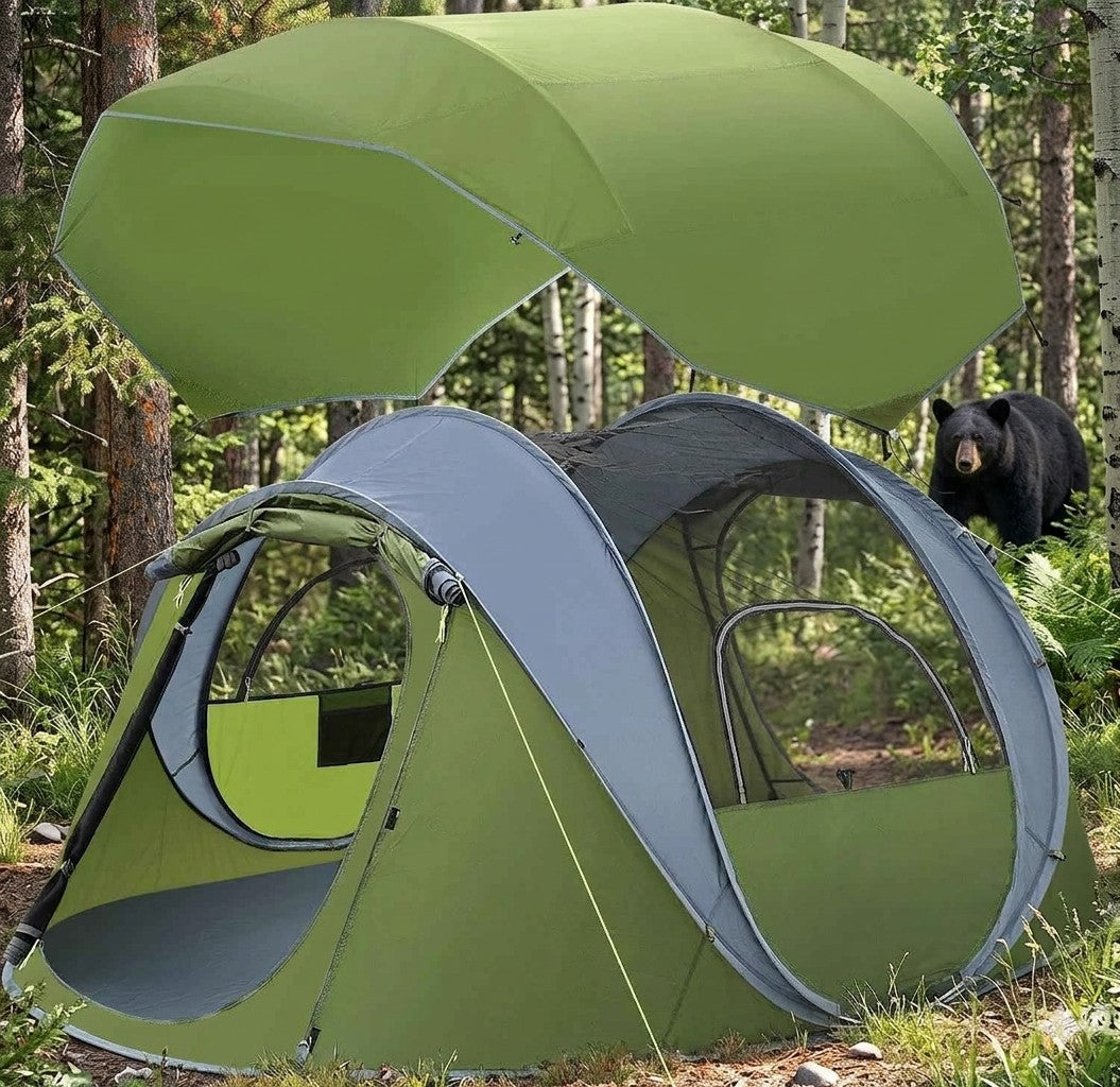 Green camping tent with bear in the background in a forest setting Big Green Bear