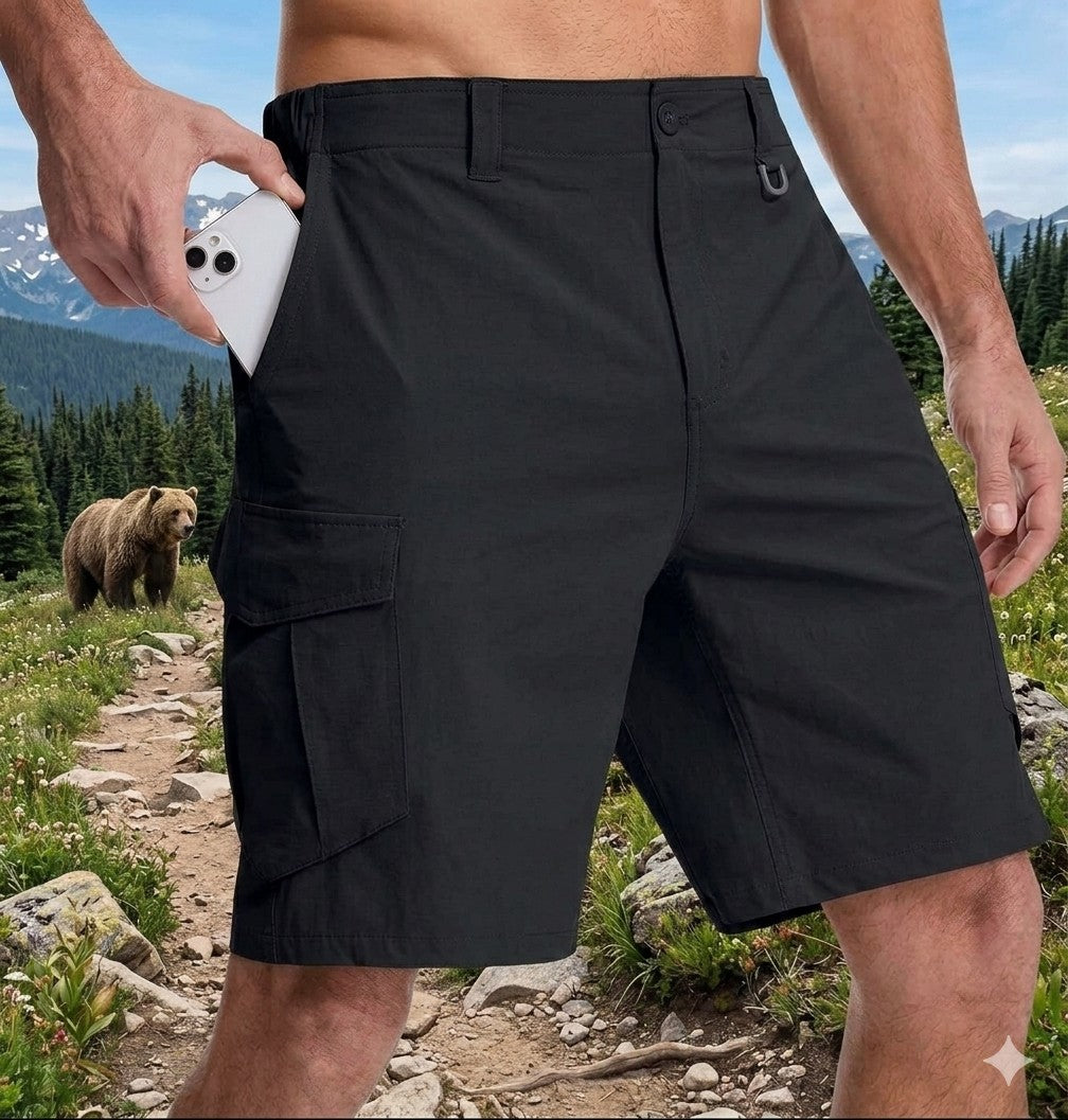 Person wearing black cargo shorts with a bear in the background