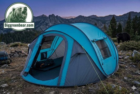 Blue camping tent in a mountainous landscape with Biggreenbear.com logo.