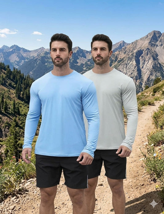 Two men wearing long-sleeve athletic shirts and shorts standing in a mountainous landscape. Biggreenbear.com Big Green Bear