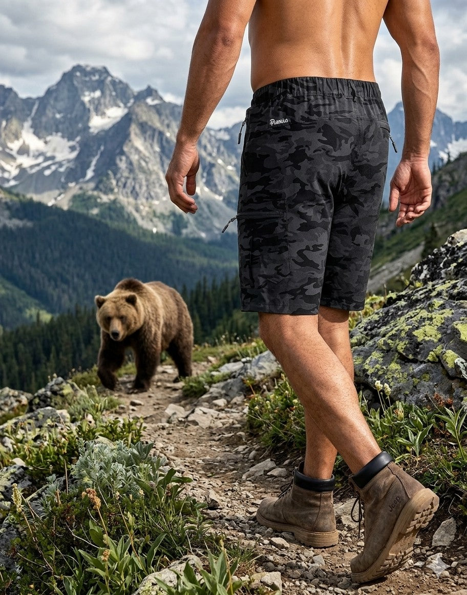 Close-up of tactical hiking shorts featuring 5 secure zipper pockets, including side cargo and back pockets for safe gear storage.